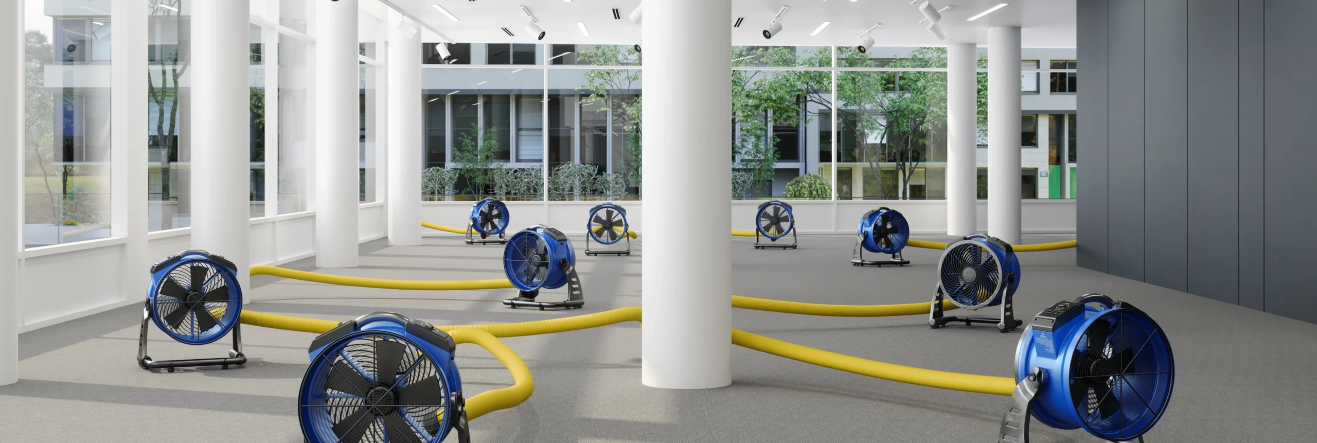 Blue fans and yellow hoses in room.