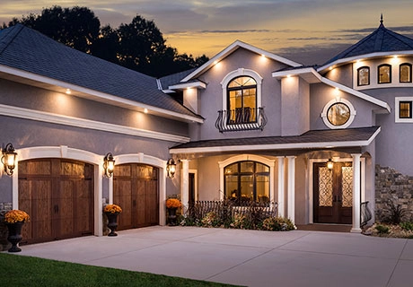 Elegant house exterior with warm lighting.